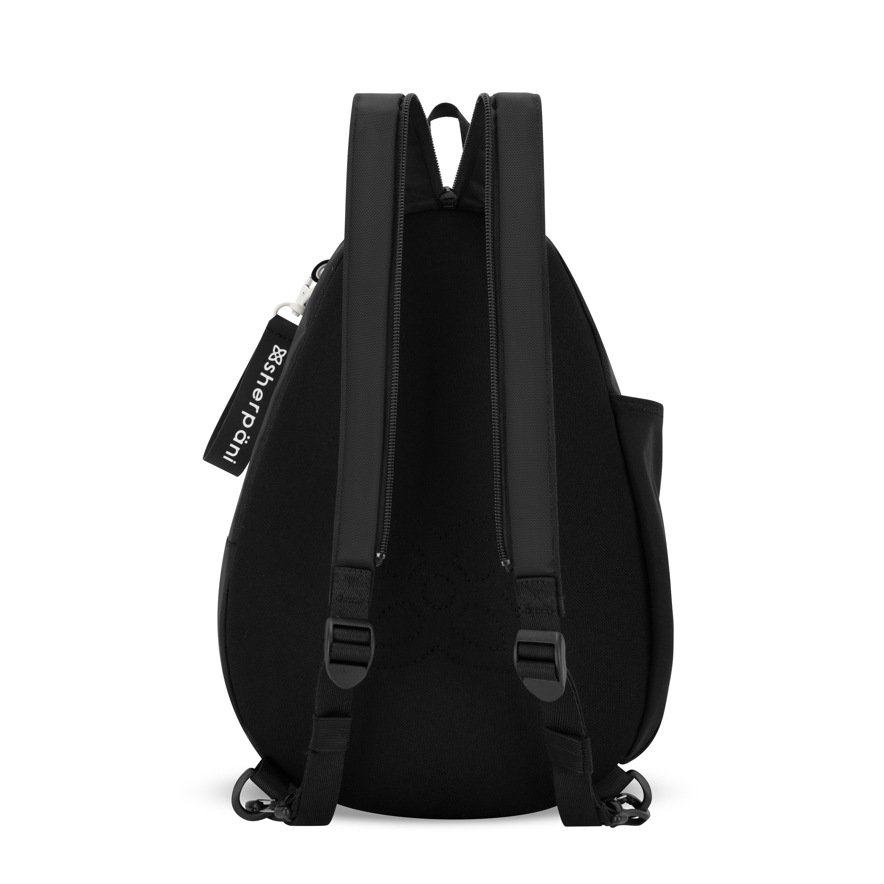 Sherpani Wayfarer Convertible Sling Backpack con leche